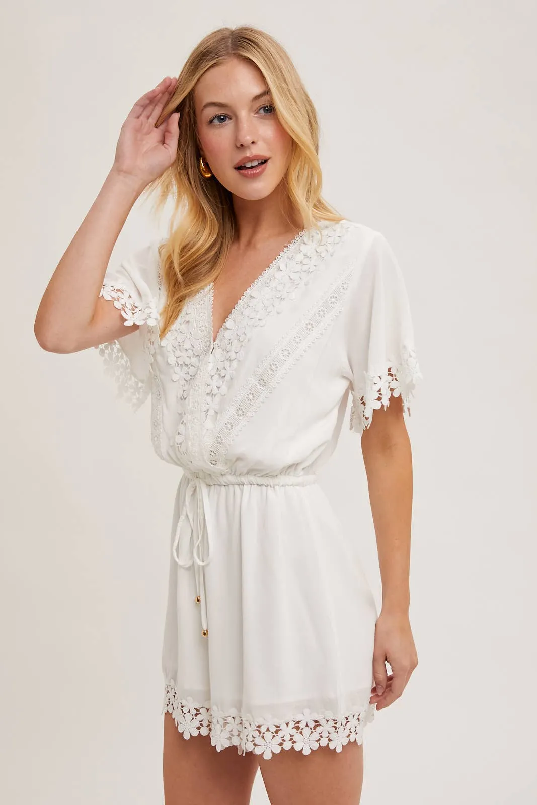 WRAP FLORAL LACE TRIMMED DRAWSTRING ROMPER: ALMOND